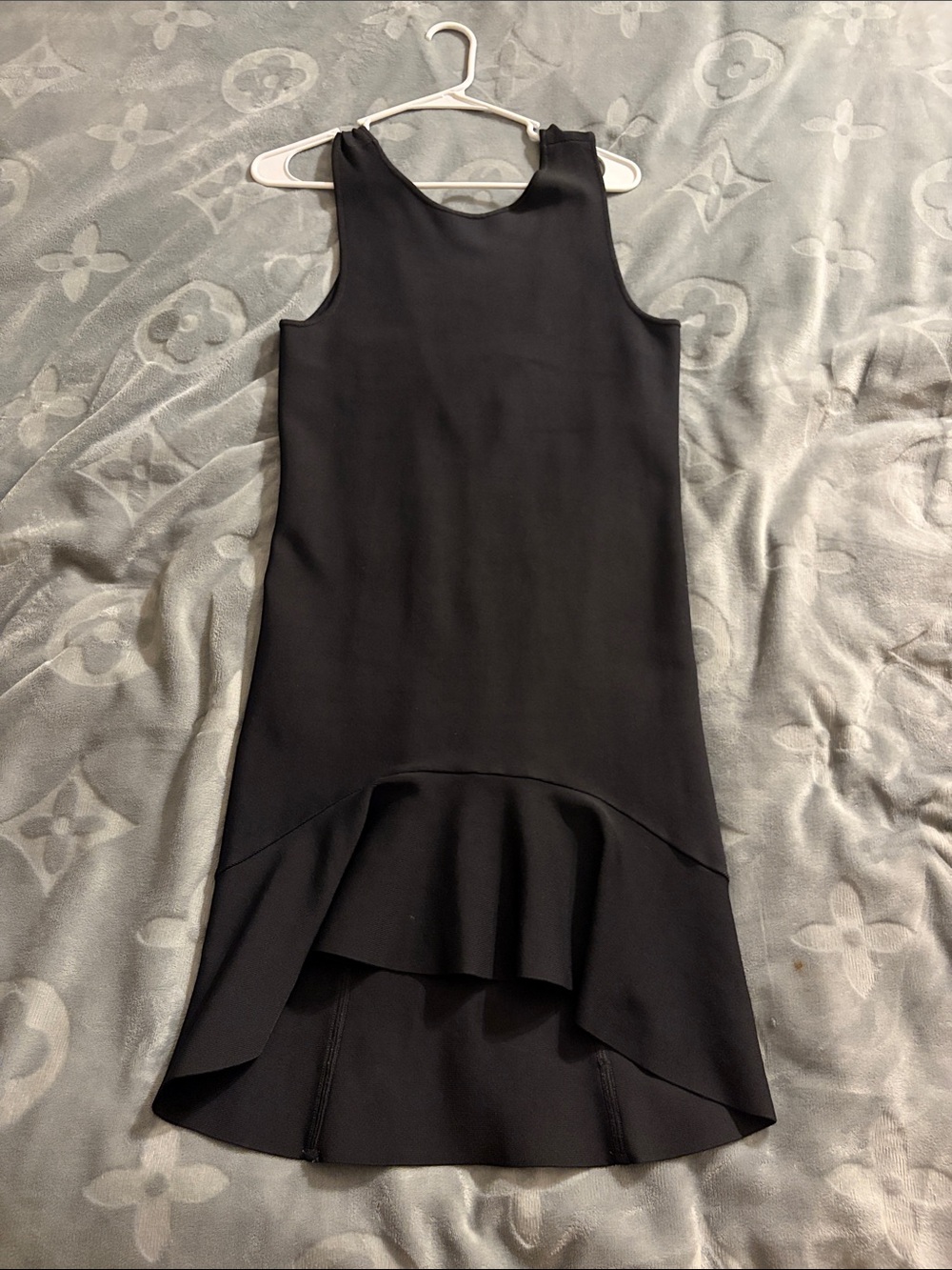 BCBG MaxAzria sleeveless dress with ruffled hem